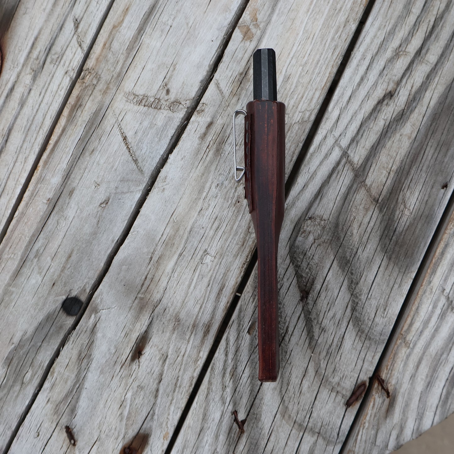 side view of leaher sheath with clip