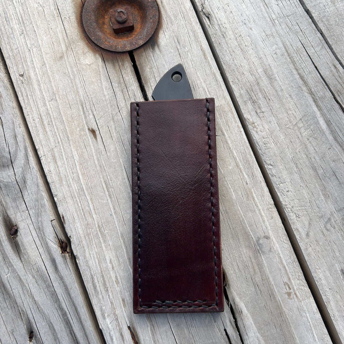 knife in leather pocket slip