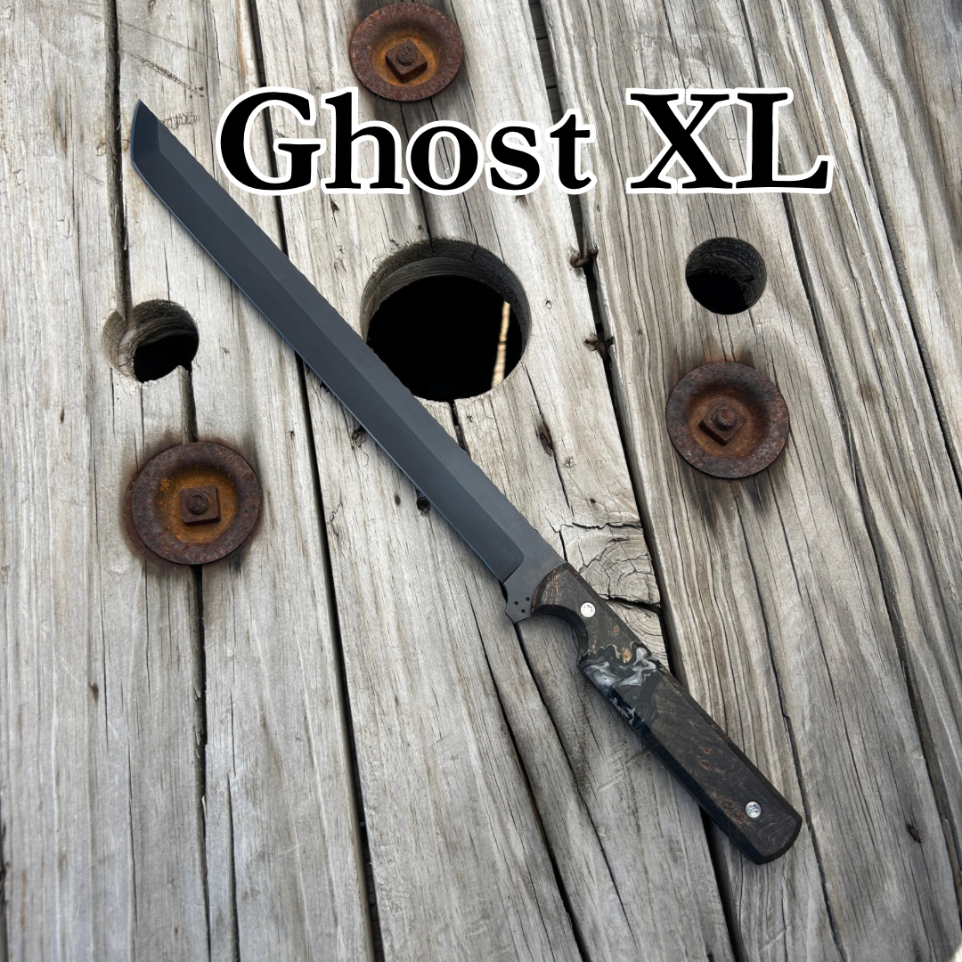 Short sword/wakizashi sitting on wooden surface. Text “Ghost XL” 