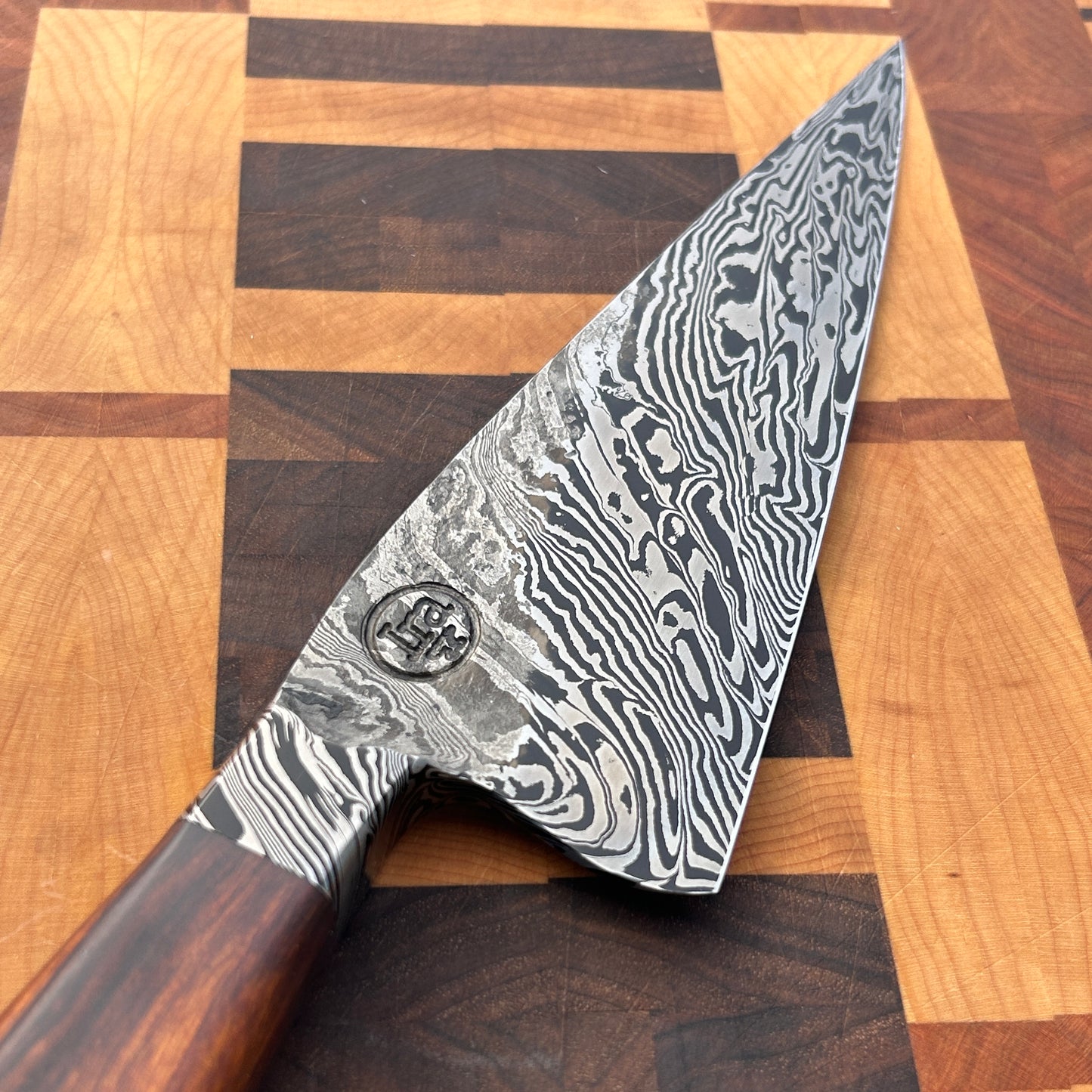 closeup of damascus kitchen knife blade