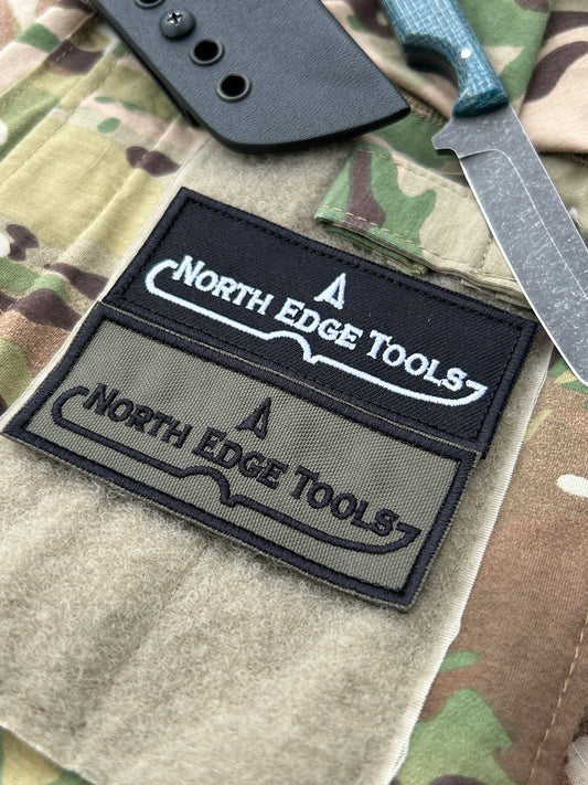 Black & OD Green morale path with North Edge Tools Logo variant on it