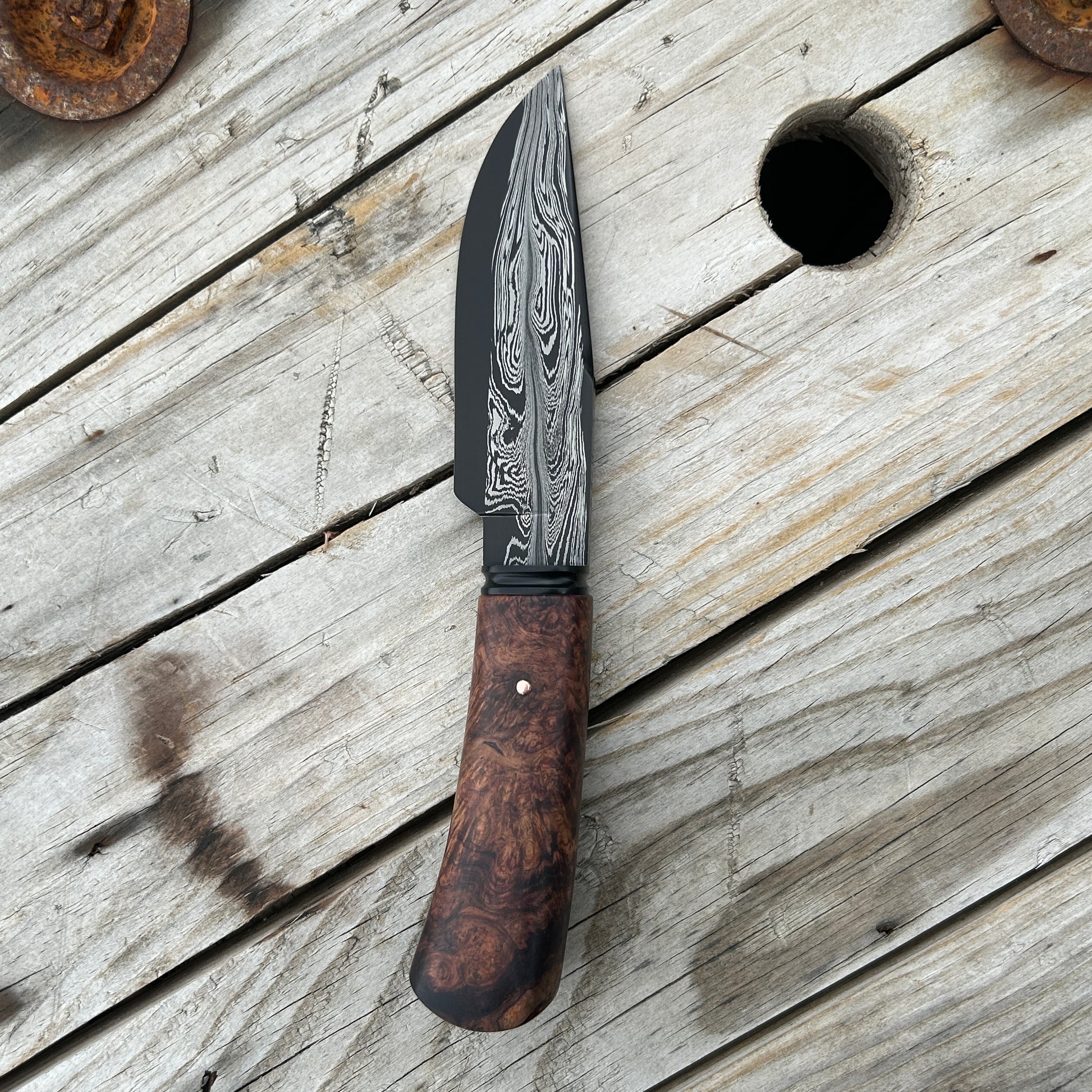 profile view of damascus hunter knife, left side