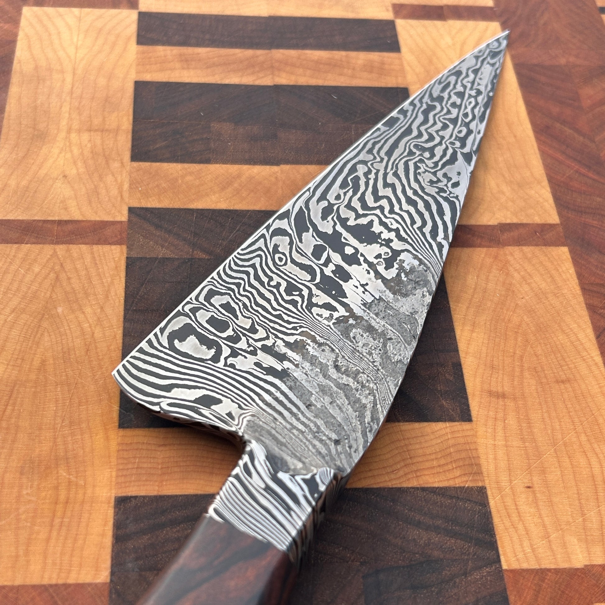 closeup of damascus kitchen knife blade