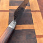 closeup of damascus integral bolster