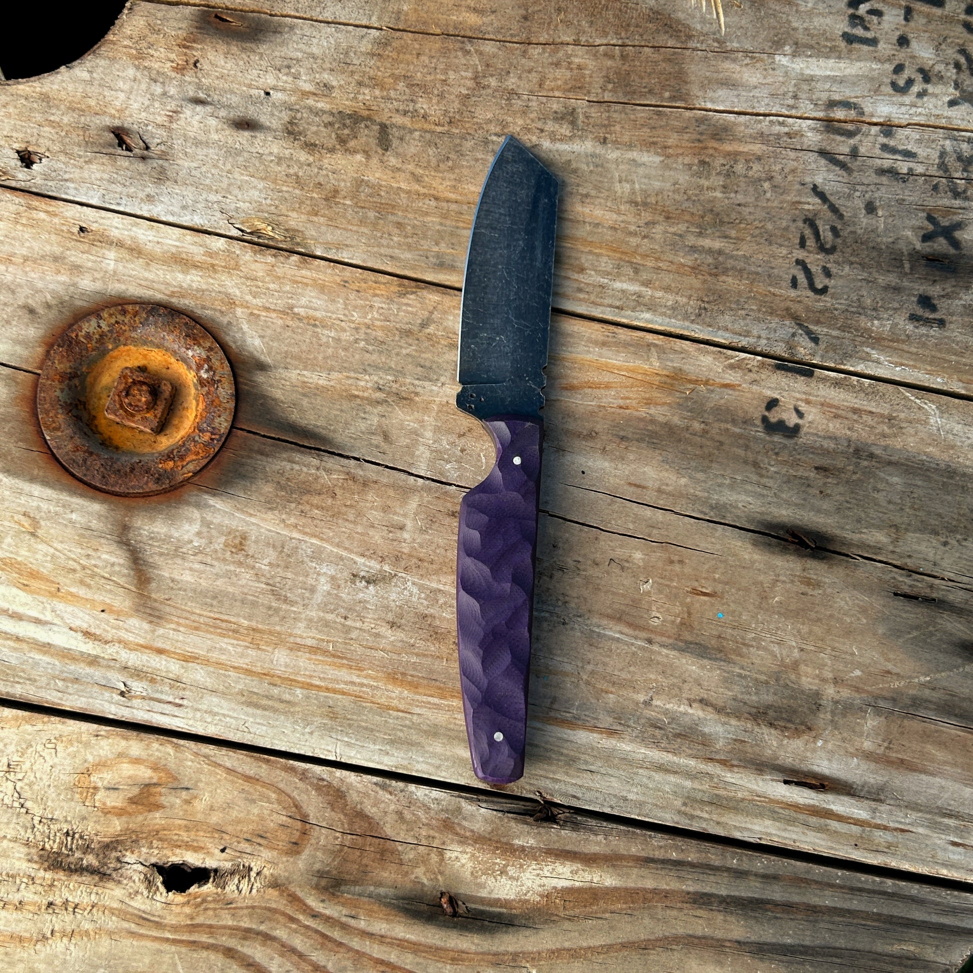 8 inch sheepsfoot style knife with black stonewashed blade & rock textured purlple G-10 handle