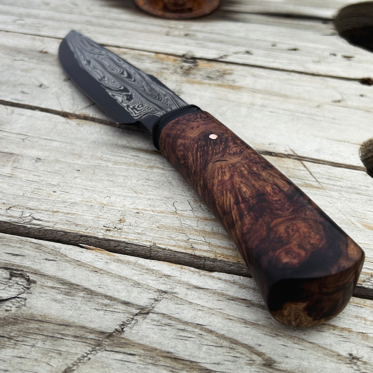 closeup of Honduran rosewood burl handle