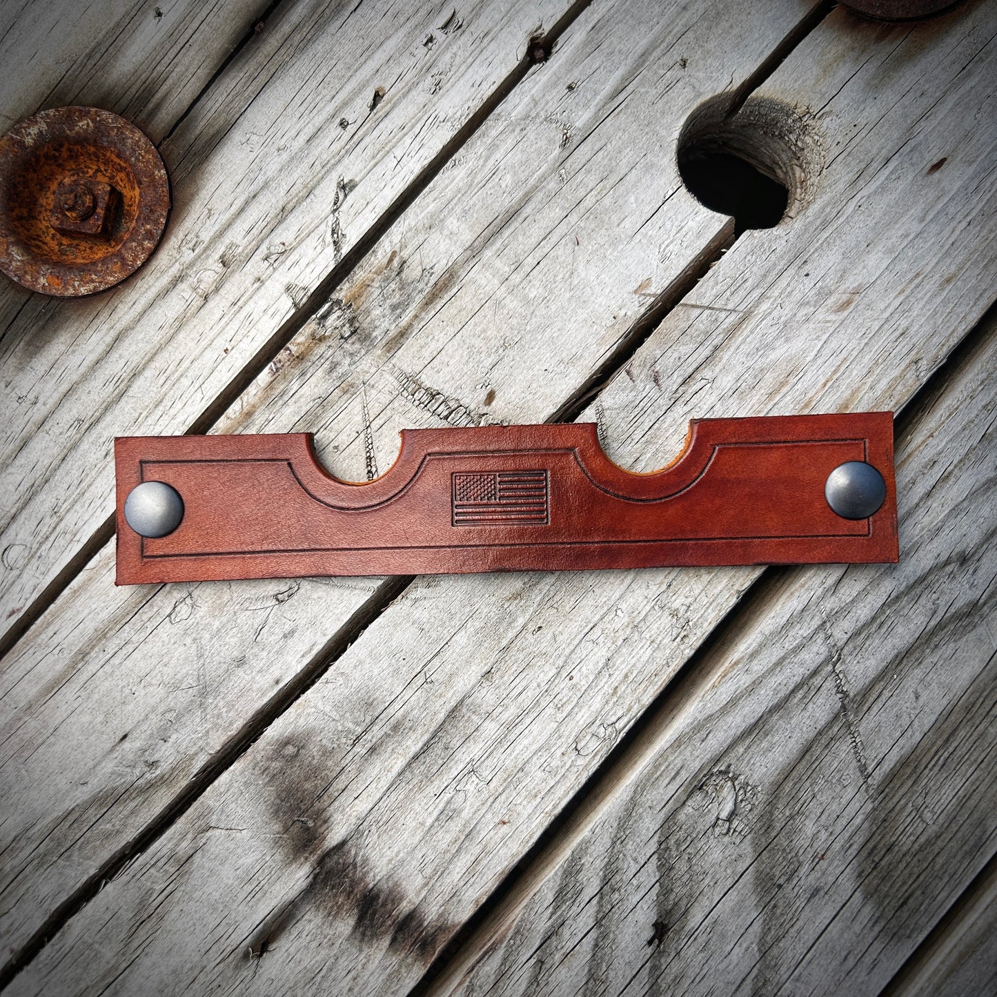 leather cigar & pipe stand unsnapped & laying flat