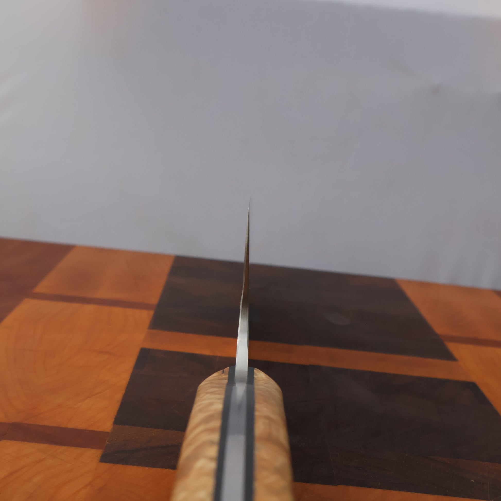 choil shot of kitchen knife showing very thing edge geometry