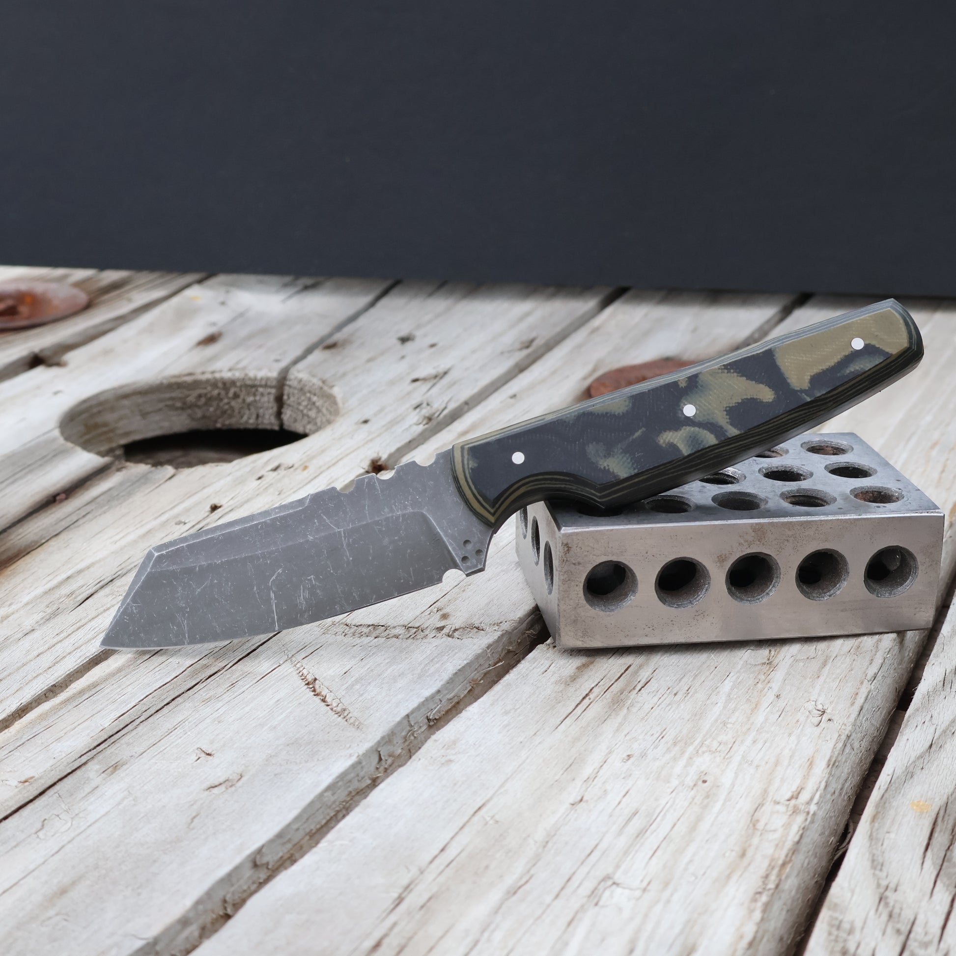 small fixed blade knife with camo G10 handle scales
