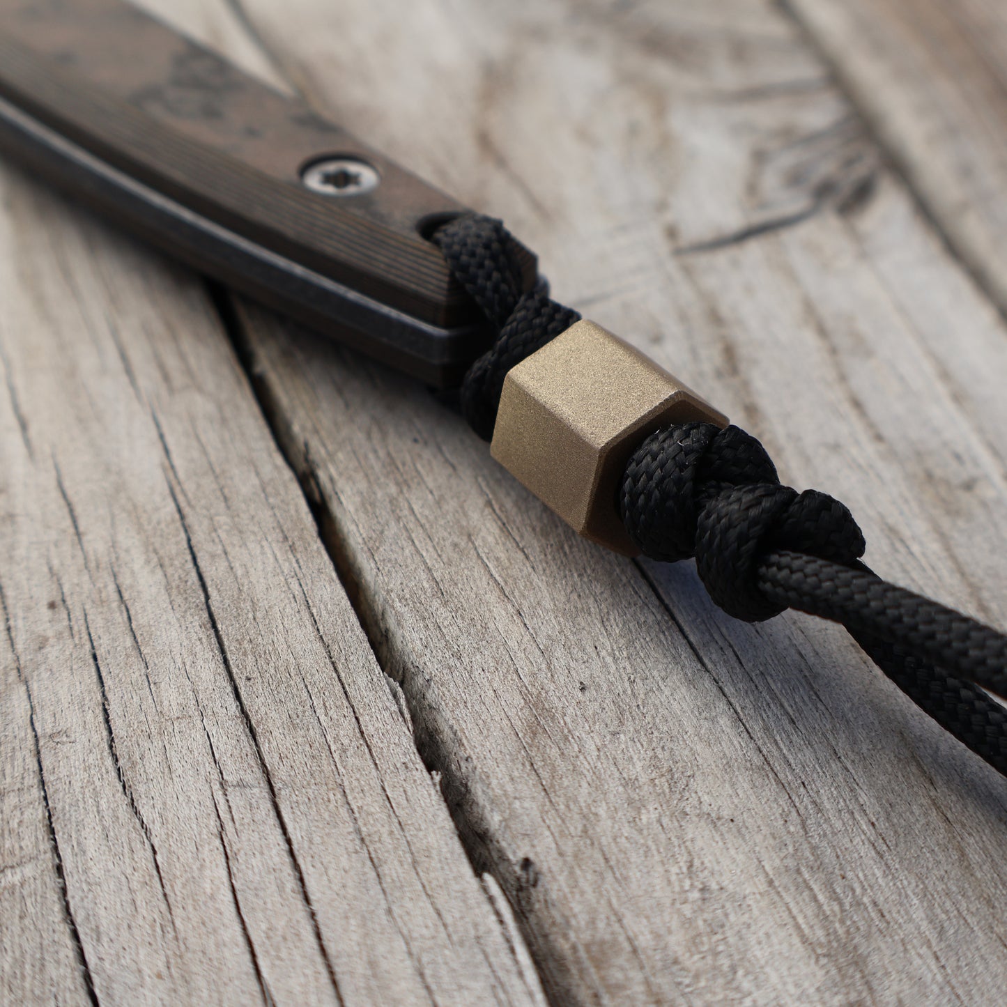 Hexagonal Brass Bead on knife handle lanyard