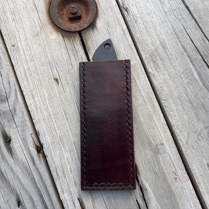 knife in leather pocket slip