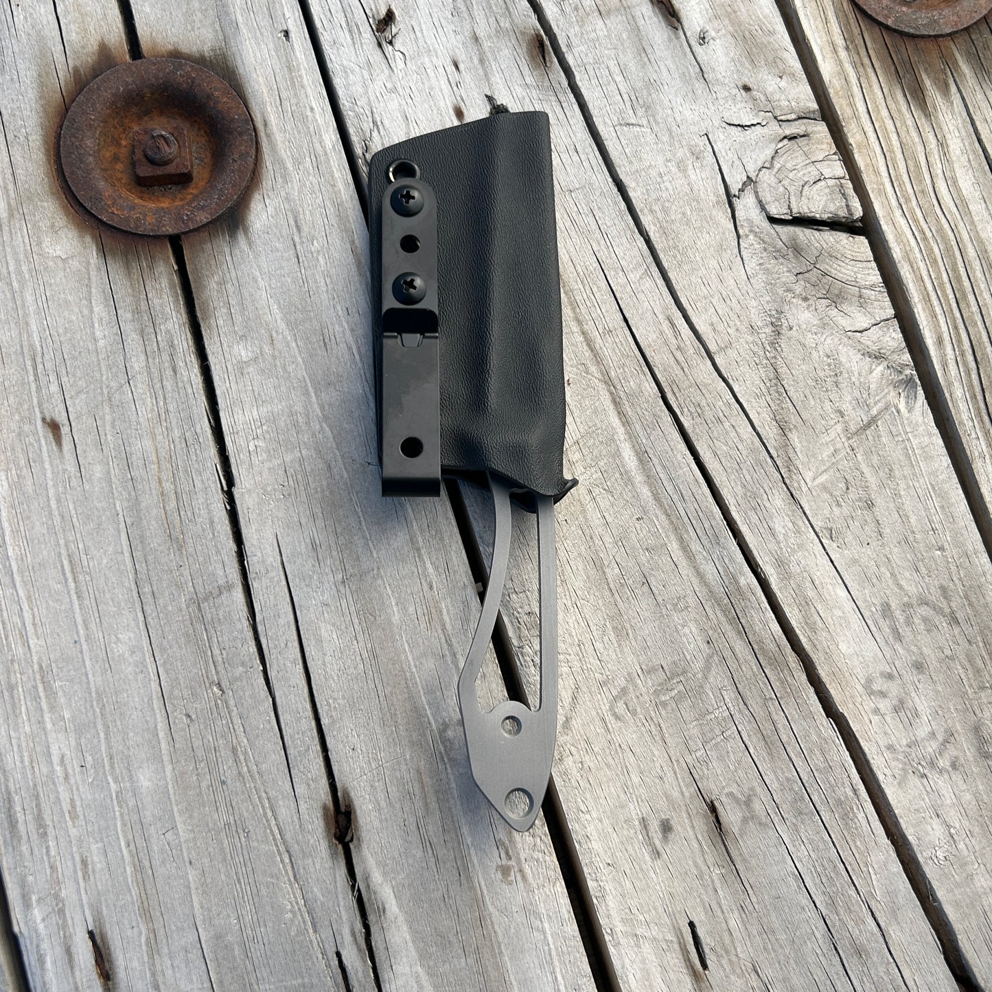 knife without handle scales secured in kydex sheath