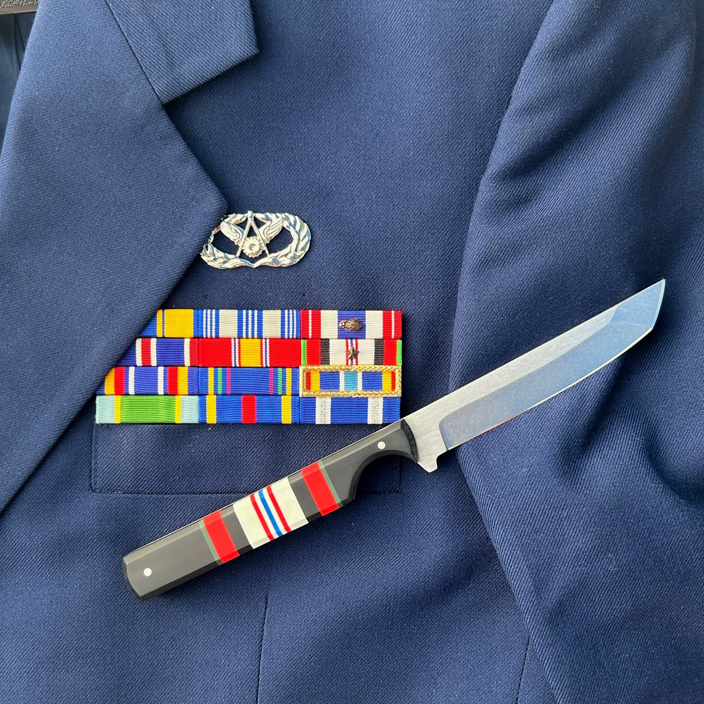 8 inch tanto knife with Afghan Campaign Ribbon handle sitting next to military ribbons