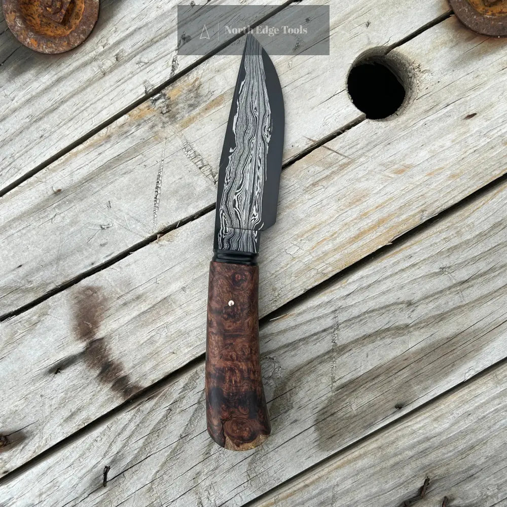 profile view of damascus hunter knife, right side